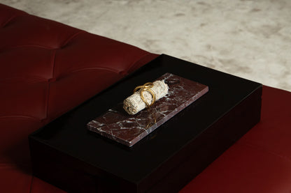 White sage smudging stick on marble tray